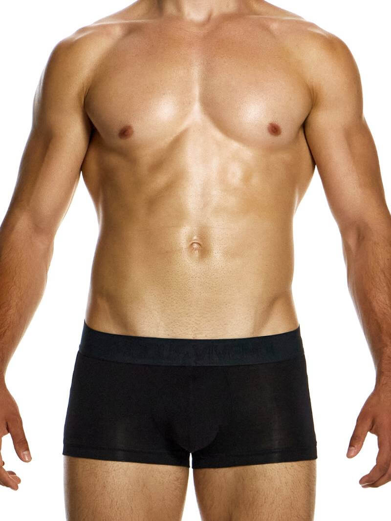 A model wearing green Modus Vivendi bamboo boxer briefs with a low-rise waistband and branded waistband.