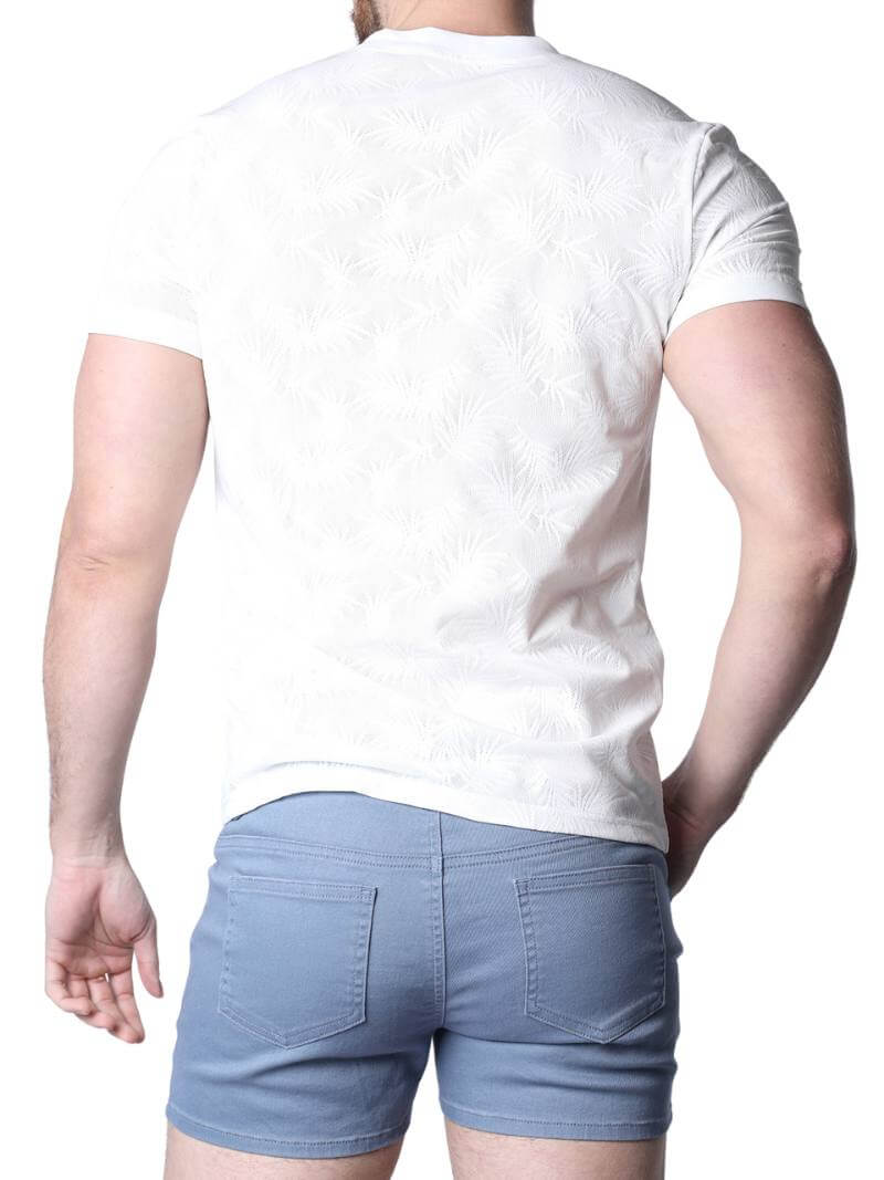 White textured t-shirt worn by a person on a white background