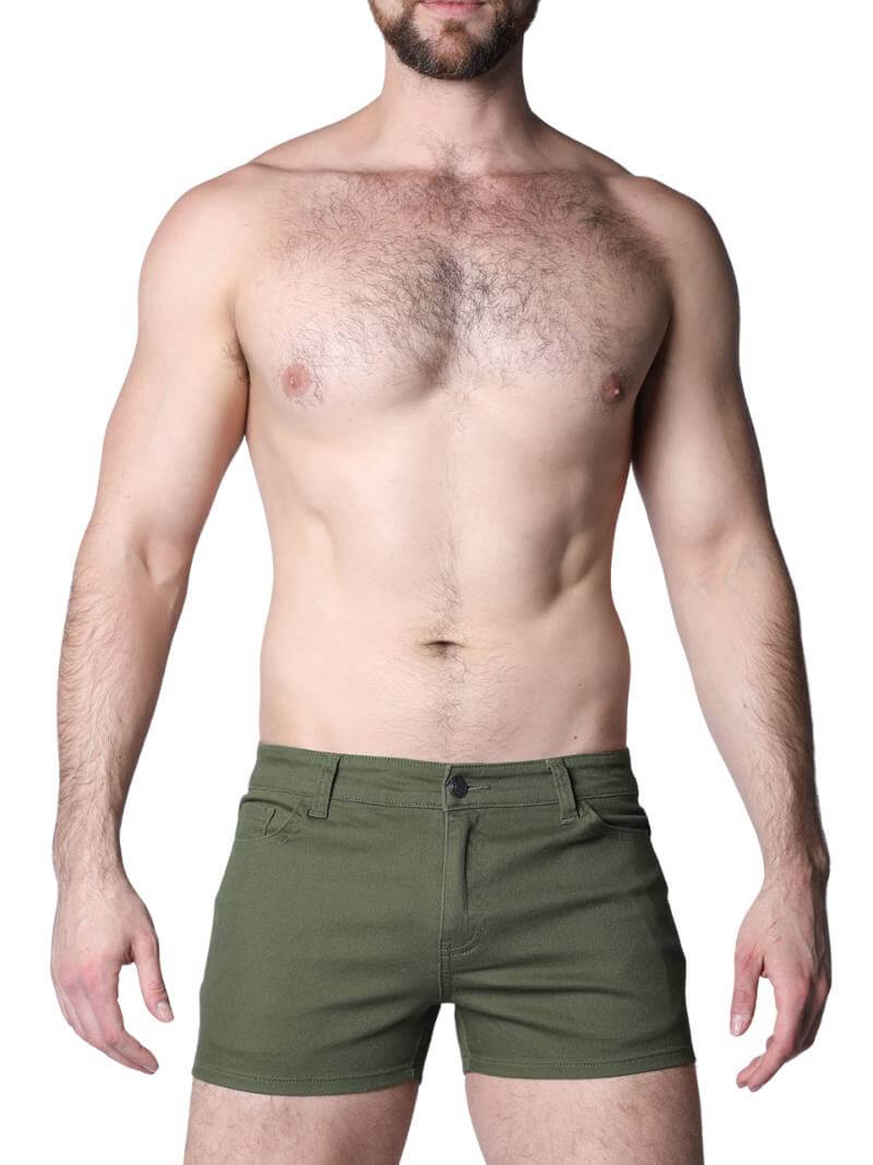 Green shorts worn by a person on a white background