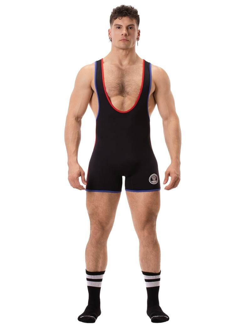 A person wearing a black wrestling singlet with Barcode Berlin branding on the left leg, featuring sporty side stripes.