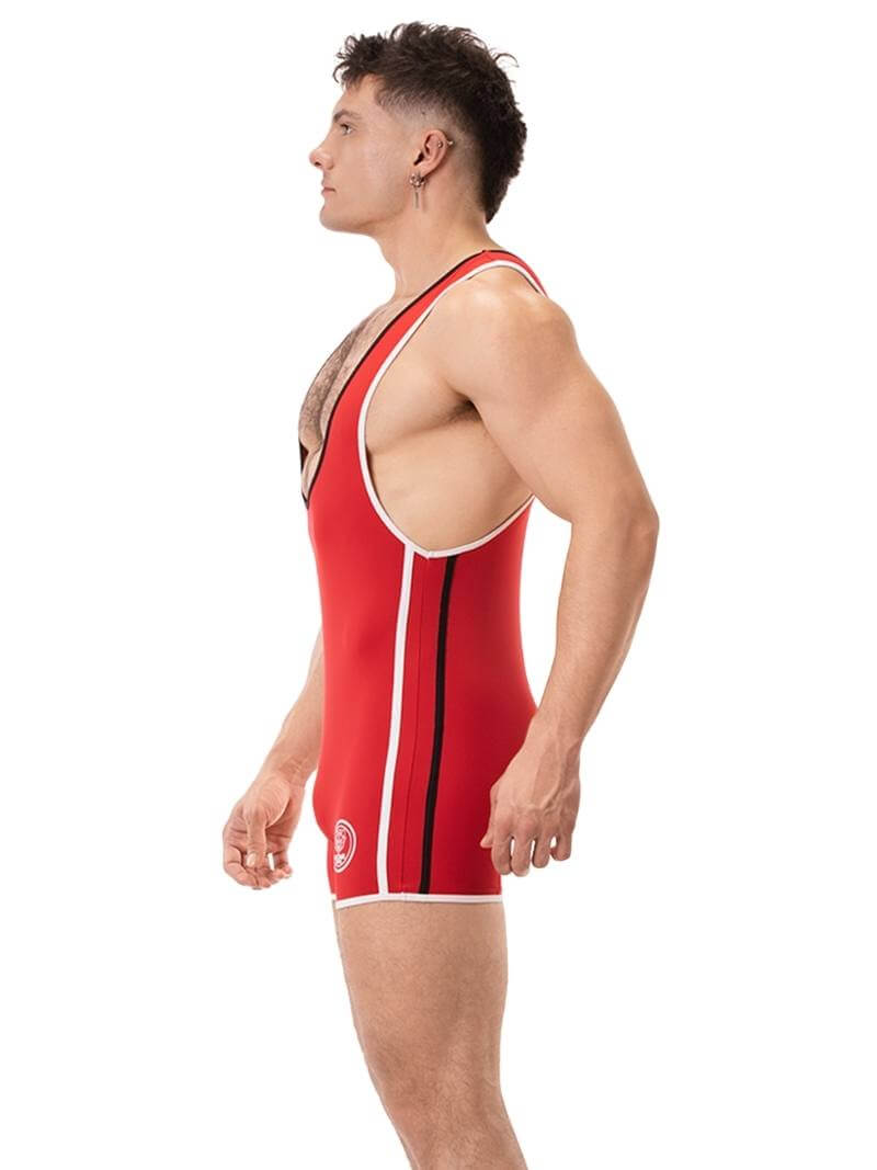 A person wearing a black wrestling singlet with Barcode Berlin branding on the left leg, featuring sporty side stripes.