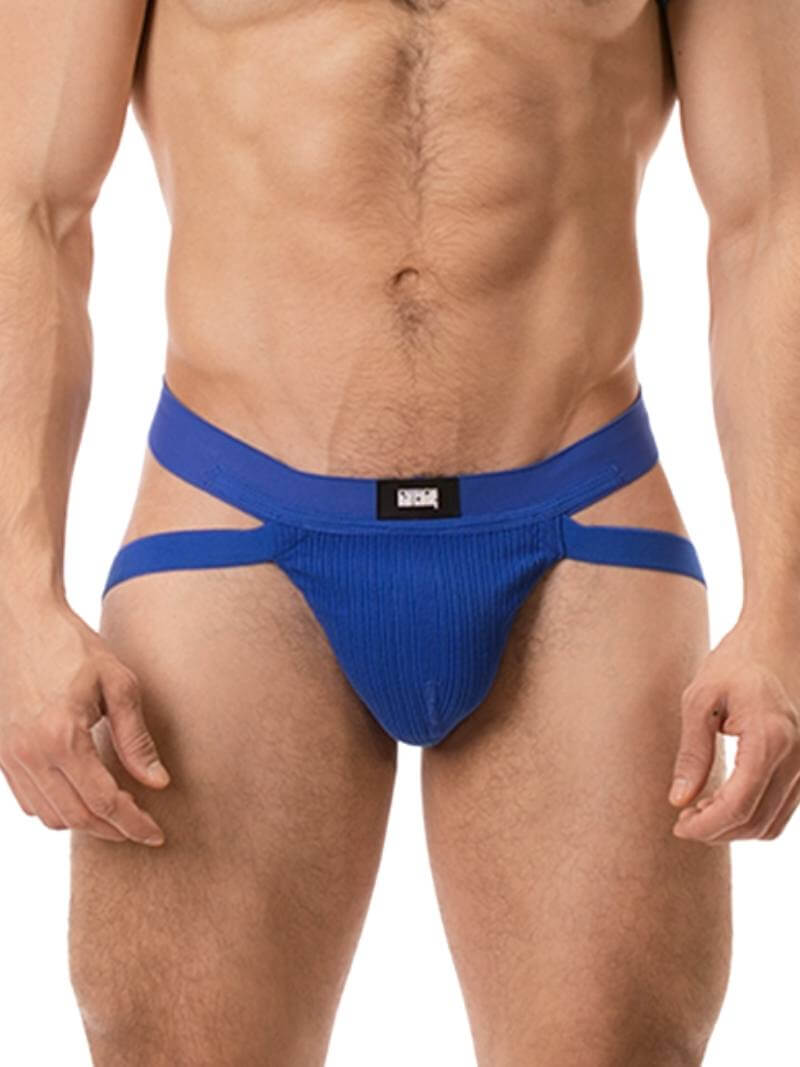 A blue ribbed cotton butt lifting jockstrap by Barcode Berlin, featuring a sturdy thick waistband and elasticated jock straps, modelled by a male model.