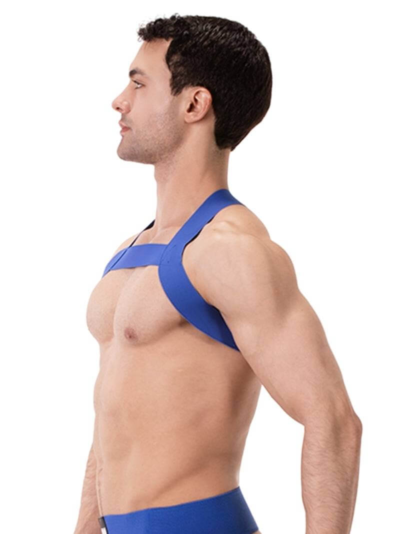 A man wearing a white elastic chest harness with straps across the chest and over the shoulders.
