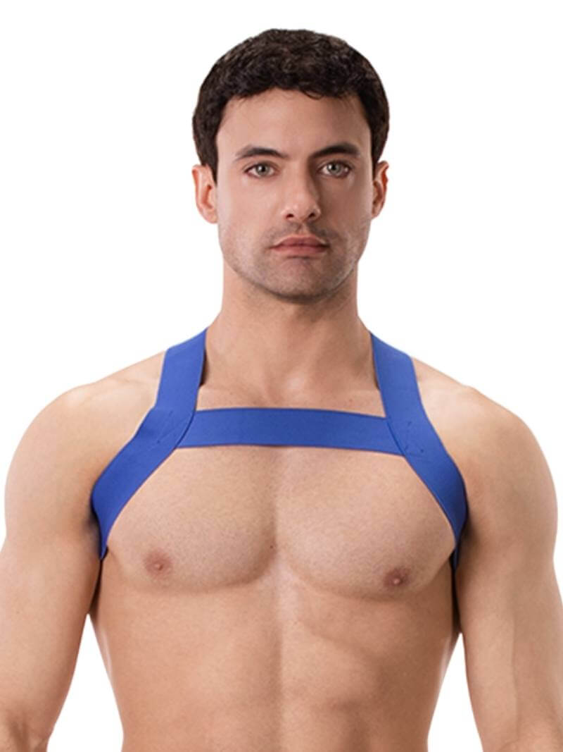 A man wearing a blue elastic chest harness with straps across the chest and over the shoulders.
