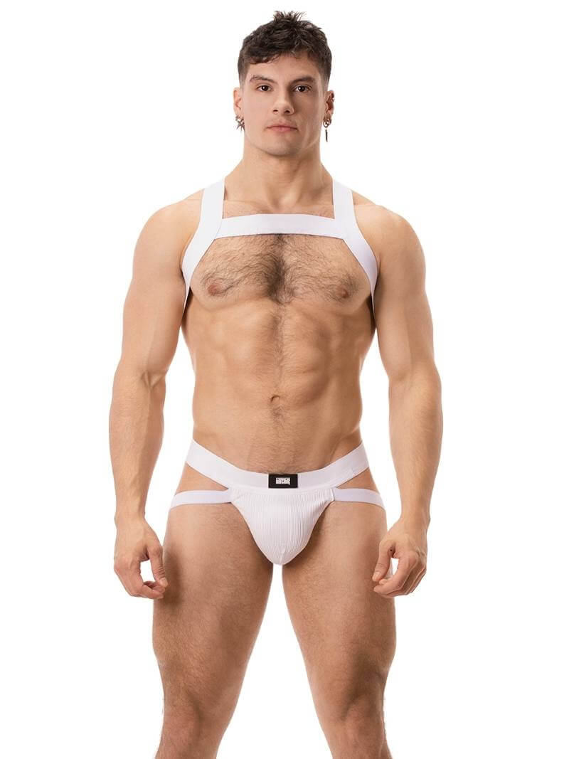 A man wearing a blue elastic chest harness with straps across the chest and over the shoulders.