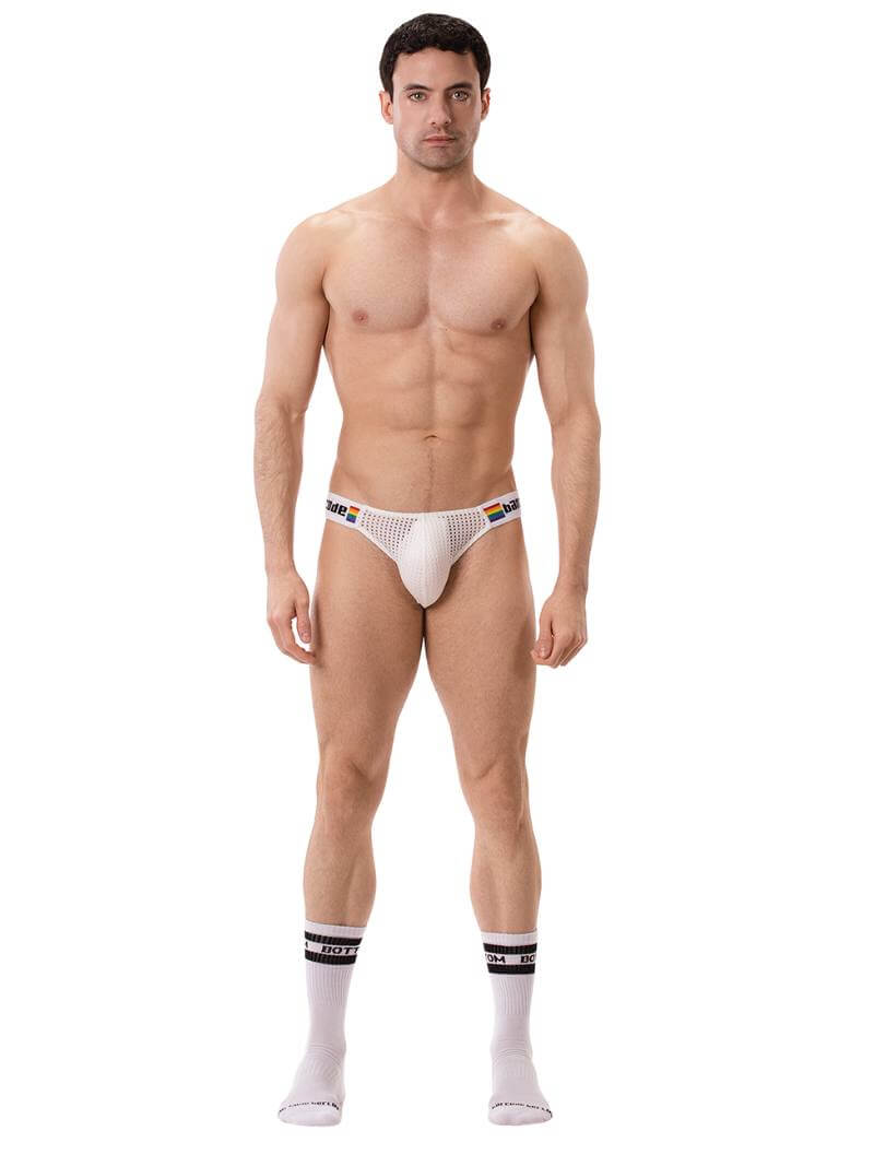 This image features the Barcode Berlin Regiro Pride Mesh Bikini Brief, modeled to showcase its fit and style. The brief has a striking design with a black mesh material that is partially see-through, offering a seductive and breathable underwear option.