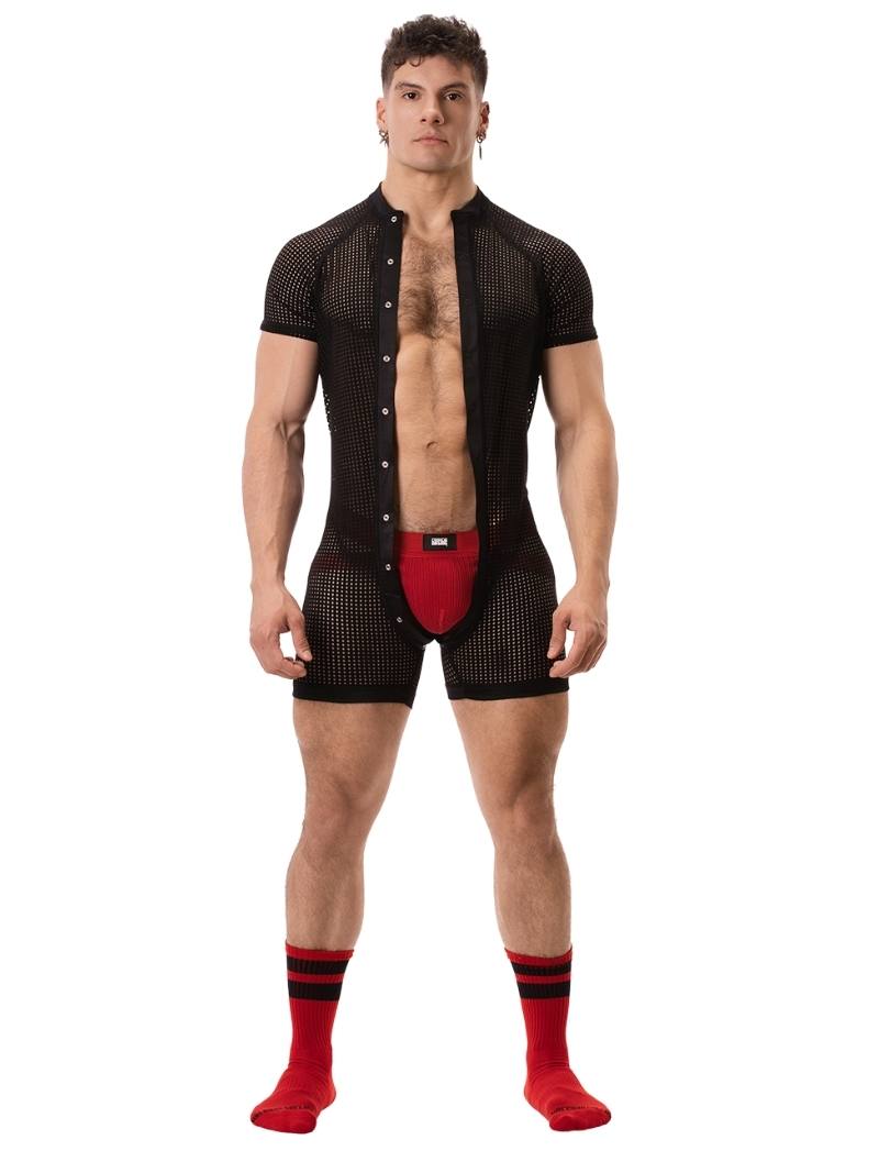A model wearing a black mesh one-piece union suit with short sleeves and a crew neck. The suit features a buttoned front and rear access.