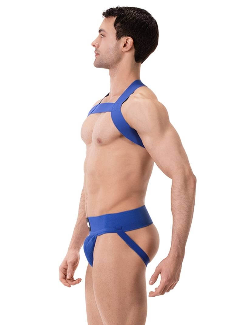 A model wearing a white Barcode Berlin Sergey ribbed cotton jockstrap, with the brand label visible on the waistband.