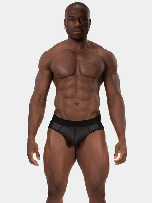 Man wearing a black underwear on a white background