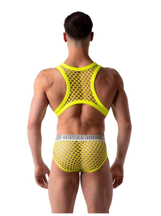 A male model wearing a black mesh partywear gay tank harness with a fishnet design.