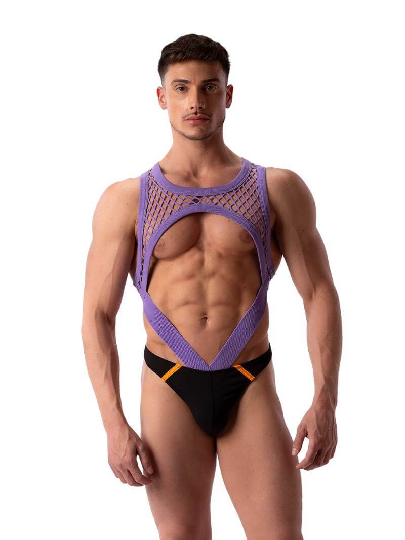 A male model wearing a purple mesh clubwear tank harness with a fishnet design.