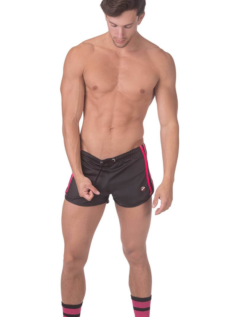 A pair of mid-calf black gym socks with colorful pride stripes on the cuff, featuring the Barcode Berlin brand logo.