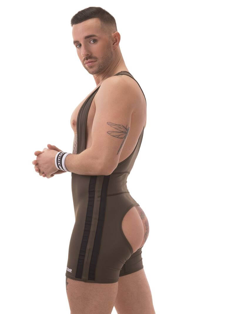 A man wearing a black Barcode Berlin backless singlet with white stripes and a low-cut neck.