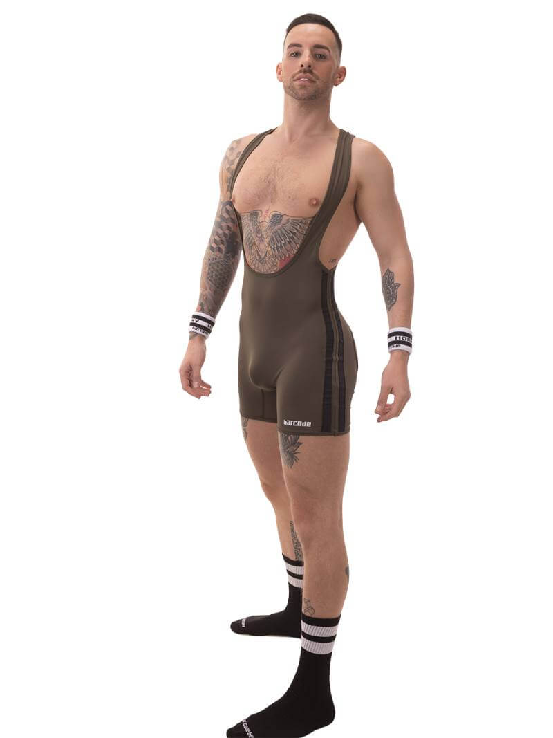 A man wearing a black Barcode Berlin backless singlet with white stripes and a low-cut neck.