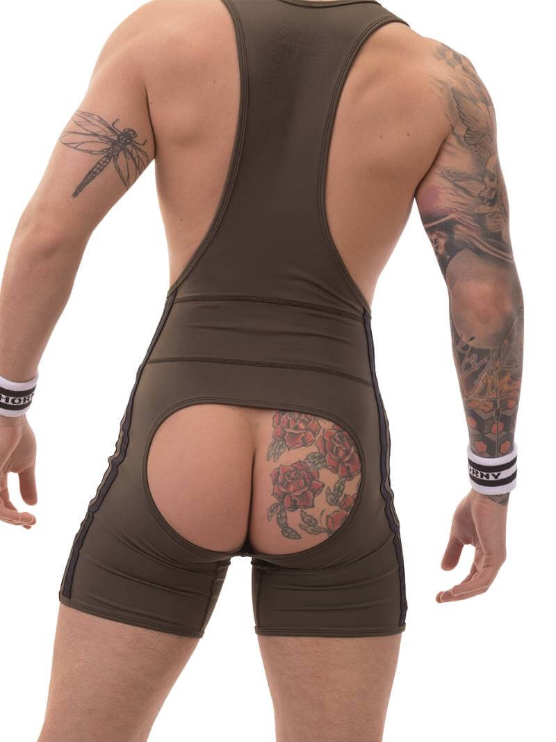A man wearing a black Barcode Berlin backless singlet with white stripes and a low-cut neck.
