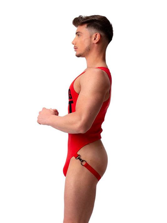A male model wearing a red bodysuit with the text 'F**KING HOT' printed in large black letters across the chest. The bodysuit includes a contoured pouch and jockstrap at the rear with metal clip buckles.