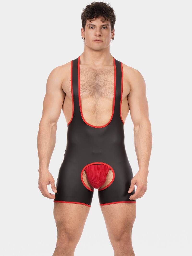 Man wearing a black and red wrestling singlet on a white background
