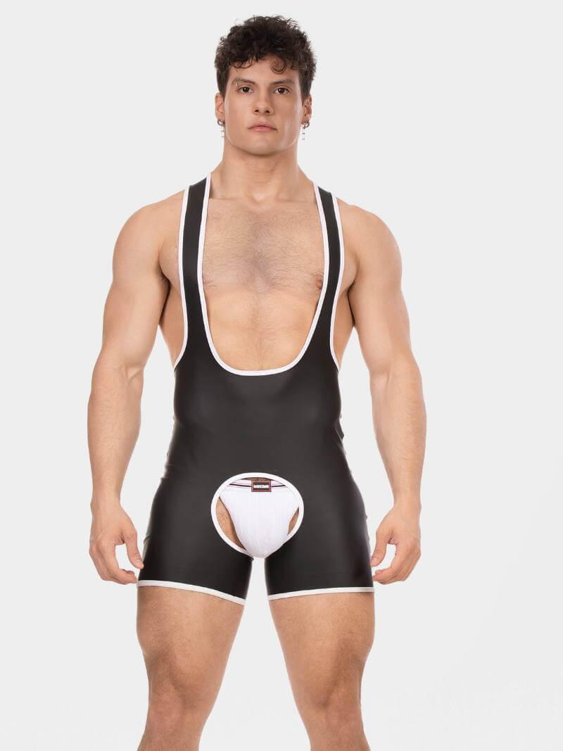 Man wearing a black wrestling singlet on a white background