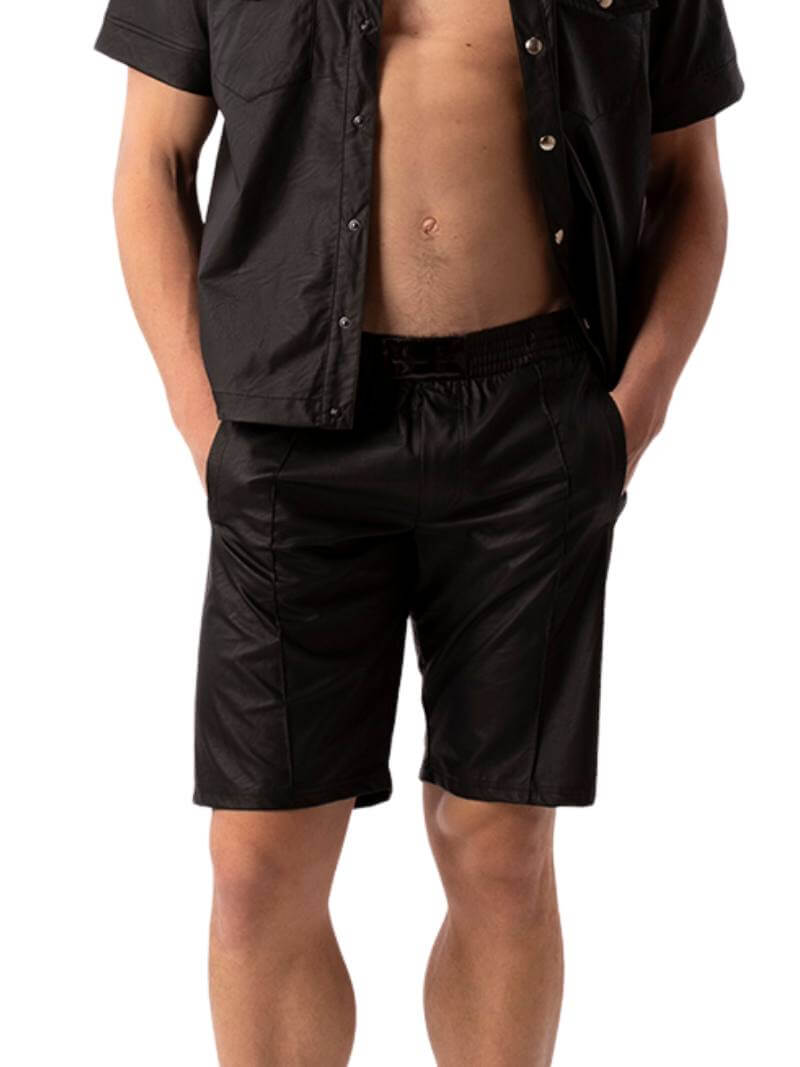 A pair of black, shiny, leather-look Bermuda shorts with a low-rise elasticated waist and side pockets, featuring a glossy finish and the brand 'BARCODE' on the chest.