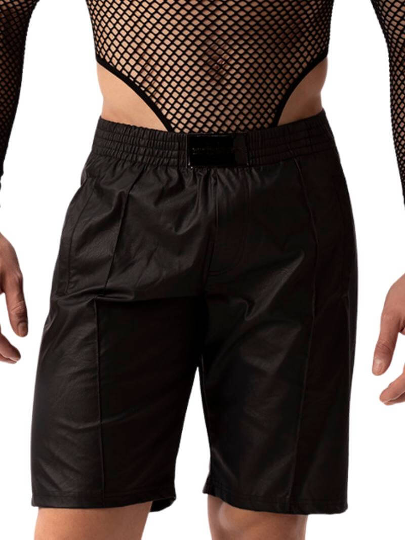 A pair of black, shiny, leather-look Bermuda shorts with a low-rise elasticated waist and side pockets, featuring a glossy finish and the brand 'BARCODE' on the chest.
