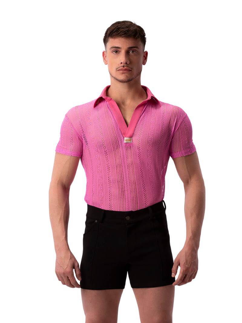 A pair of navy blue, short-leg Barcode Berlin Simon shorts with a pink, short-sleeve shirt in the background.