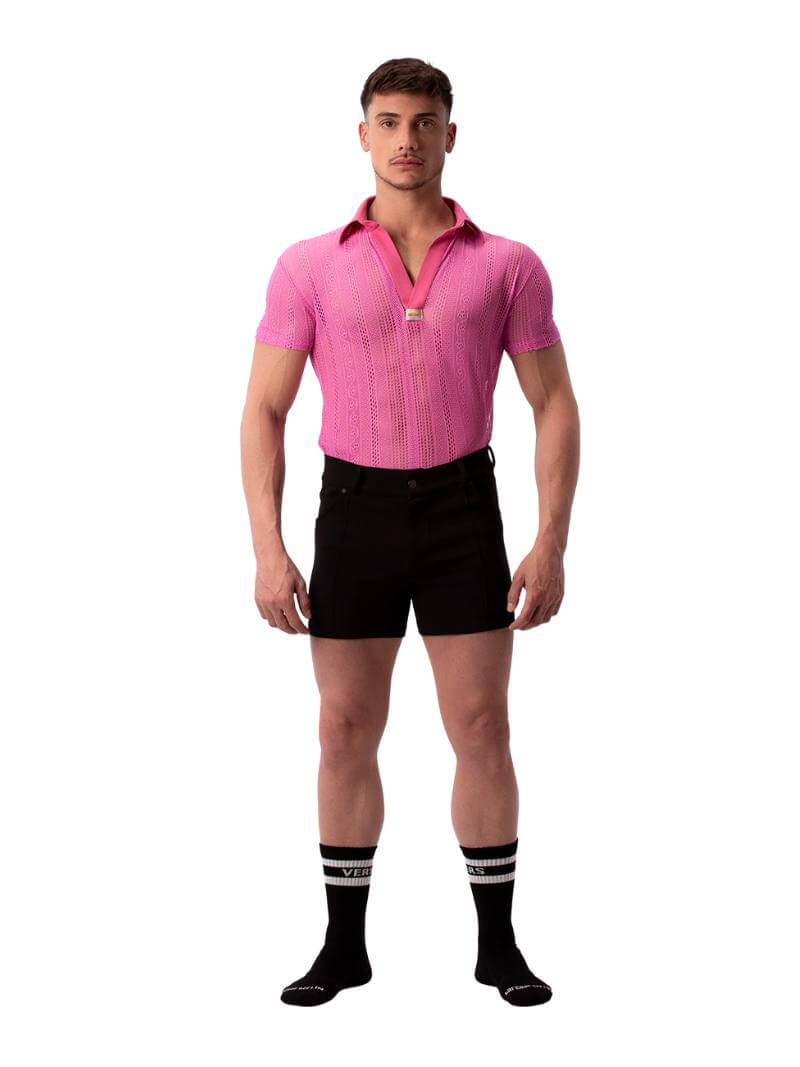A pair of navy blue, short-leg Barcode Berlin Simon shorts with a pink, short-sleeve shirt in the background.