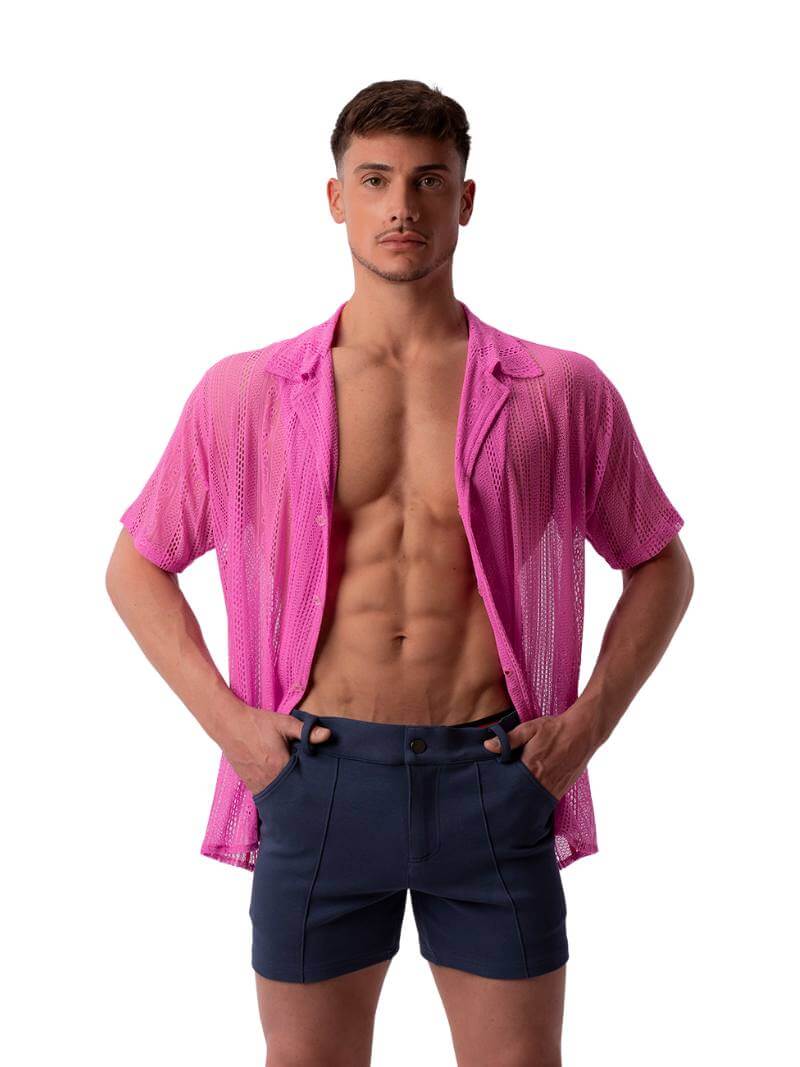 A pair of navy blue, short-leg Barcode Berlin Simon shorts with a pink, short-sleeve shirt in the background.