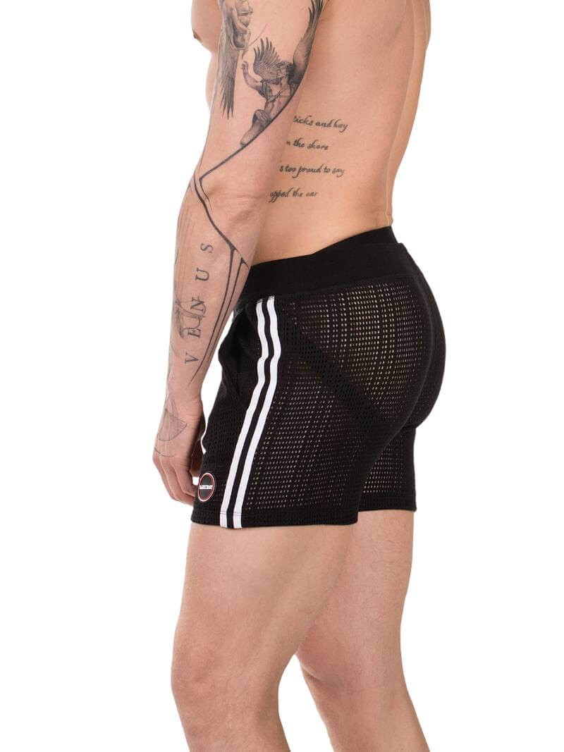 Black mesh shorts with white stripes worn by a person on a white background