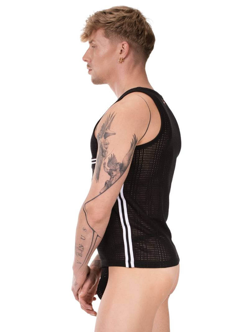 Person wearing a black sleeveless top with white stripes on a white background