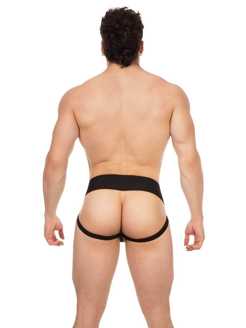 Man wearing a black thong on a white background