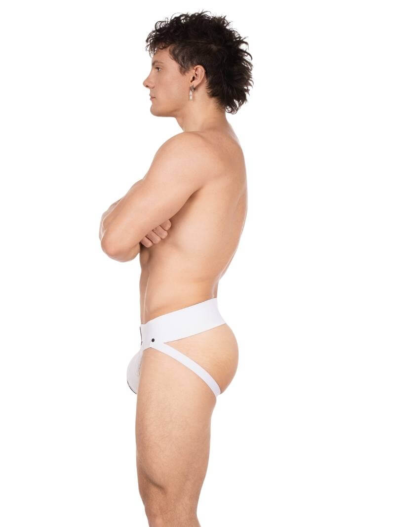 Person wearing a white thong against a white background