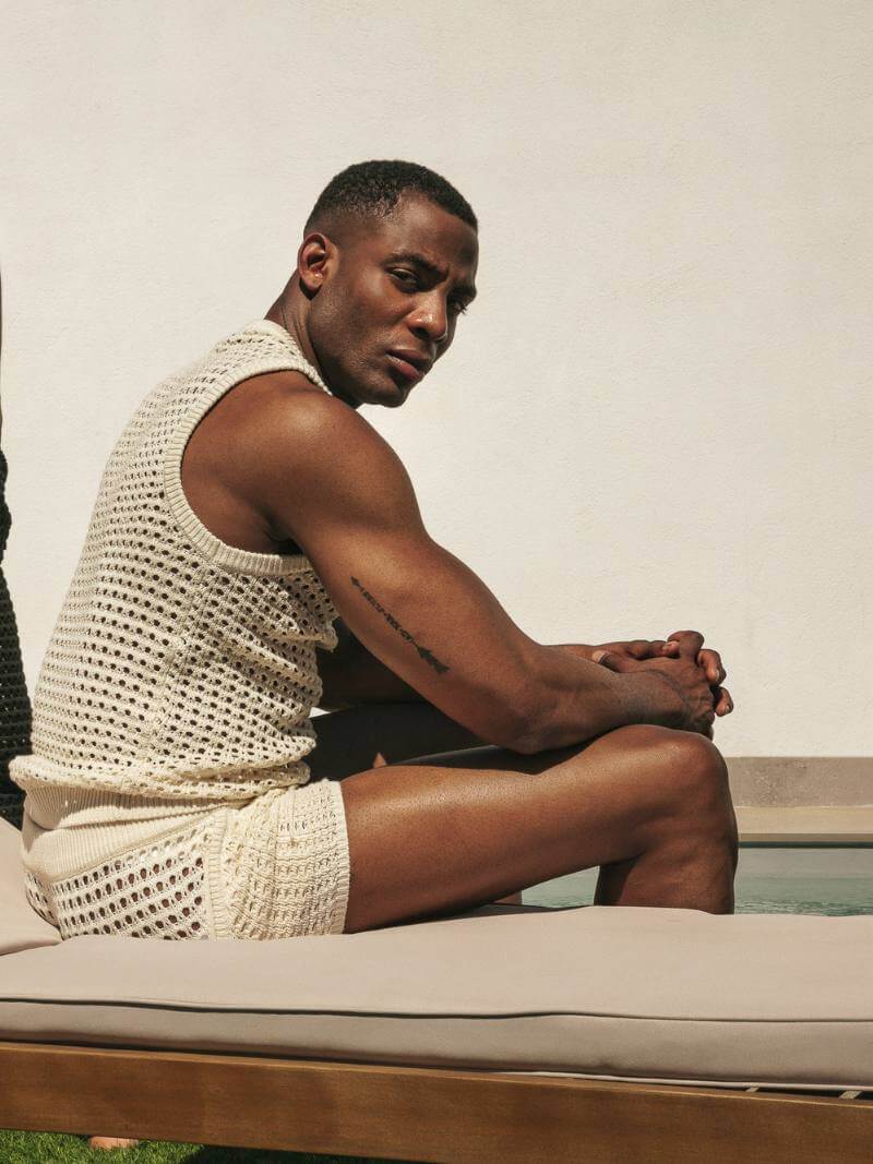 Model Wearing CODE 22 Men's Designer Diamond Knit Holiday Clothes