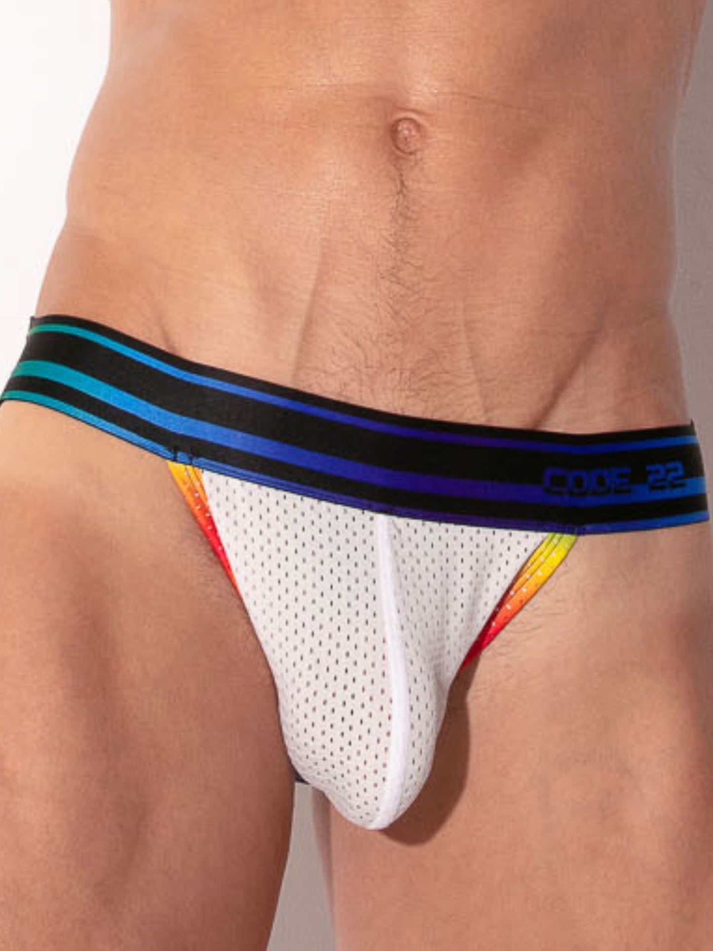 White men's underwear with colorful waistband on a plain background