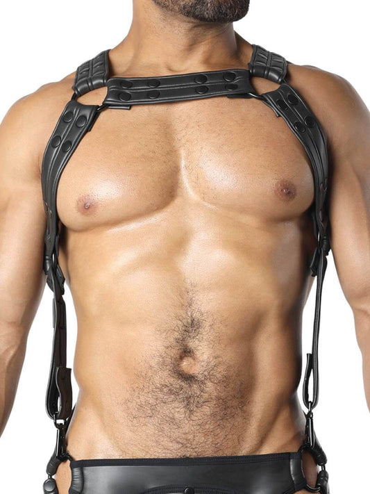 This image features the CellBlock13 Dungeon Neoprene Body Harness, showcased on a model to highlight its fit and design. The harness is crafted from smooth, black neoprene rubber, providing a stretchy and comfortable fit.
