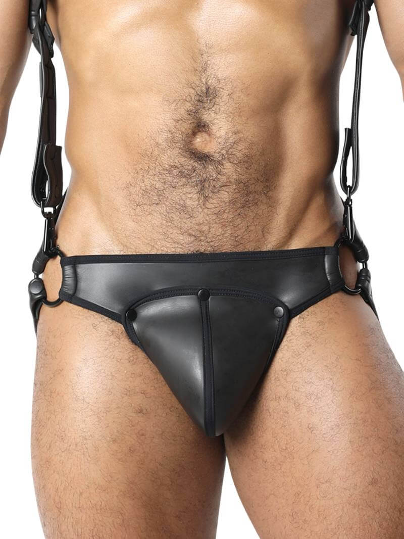 A neoprene jockstrap with matte black body and red contrast trim, featuring a removable pouch, metal O-rings, and adjustable straps.