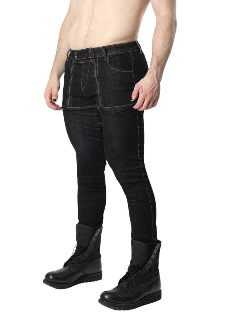 A person wearing a pair of dark blue denim jeans with visible leather branded patch and metal buttons. The jeans feature a zippered front and multiple pockets.