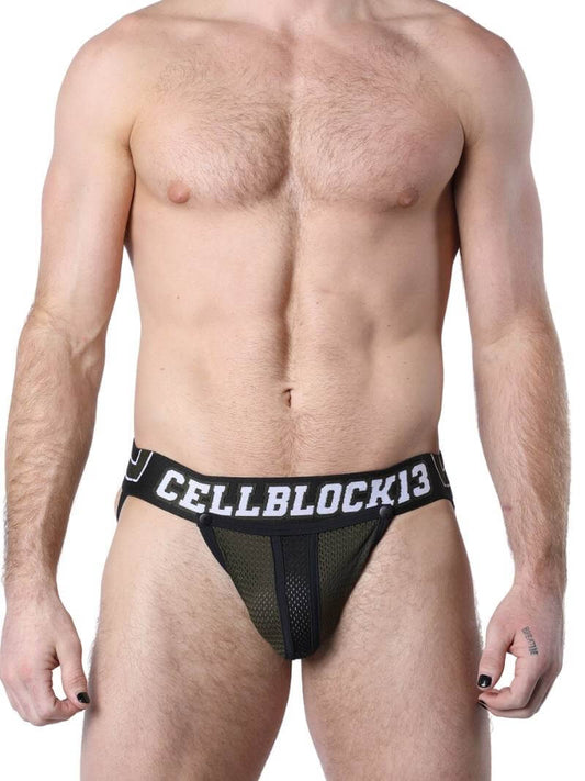 A model wearing a black mesh jockstrap with the brand name 'CellBlock13' on the waistband. The jockstrap features a removable pouch and is designed with sporty, breathable mesh material.
