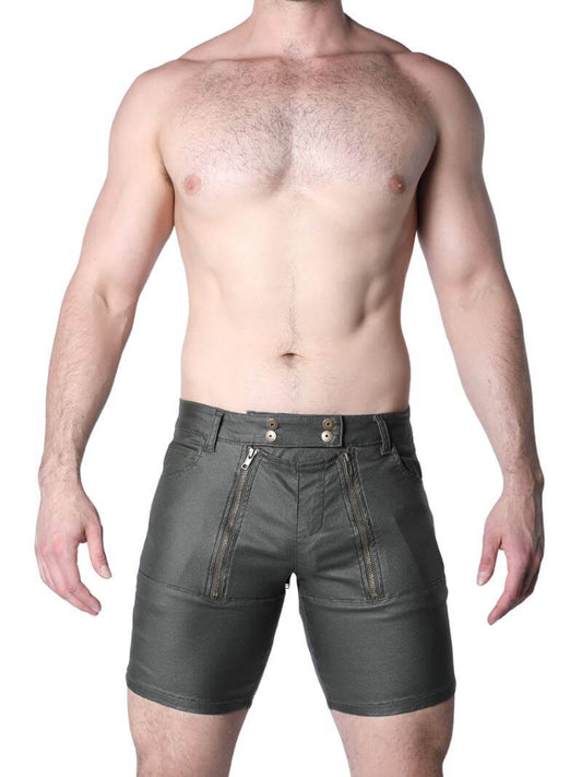 Man wearing dark green leather shorts on a white background