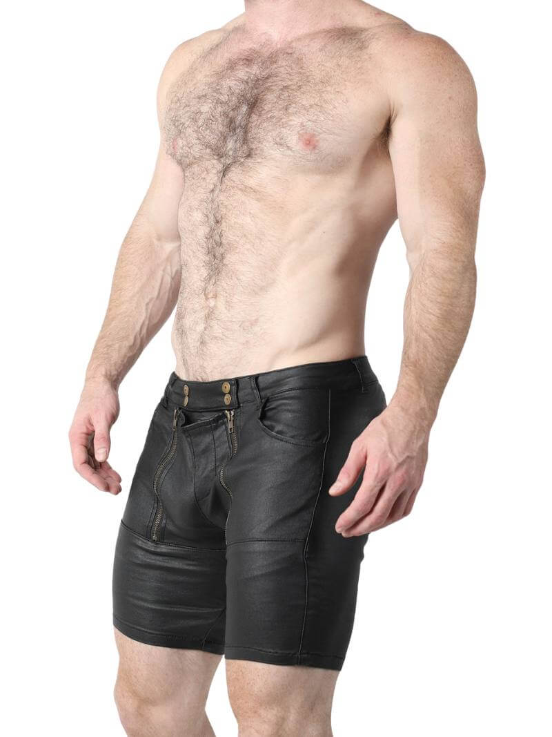 Man wearing black leather shorts on a white background