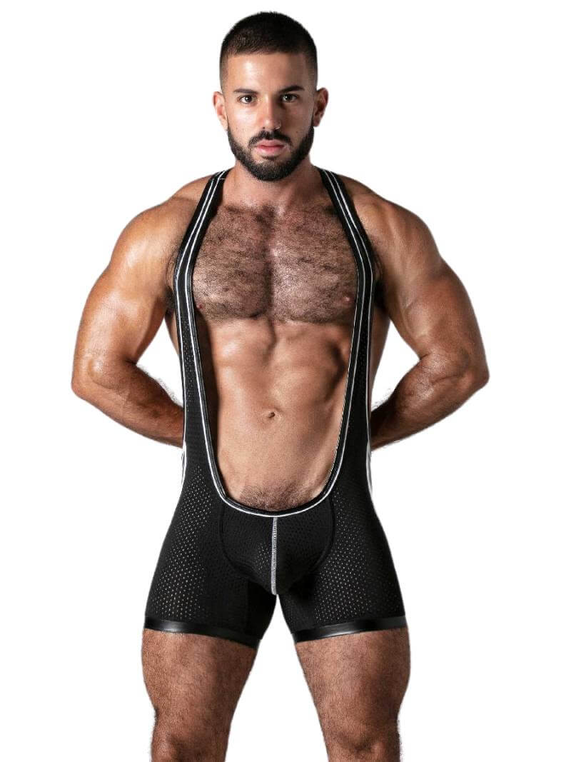 A man wearing a black Locker Gear mesh singlet with contrast stitching and trims, featuring leatherette panels to leg openings.