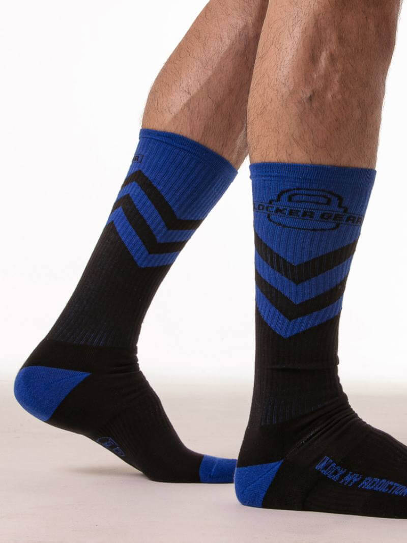 Black and blue socks with a zigzag pattern on a white background