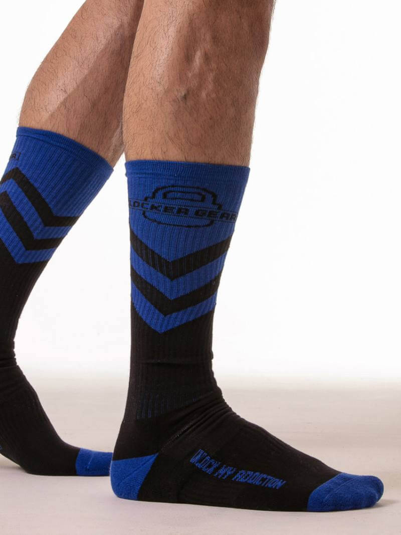 Black and blue socks with a geometric pattern on a white background