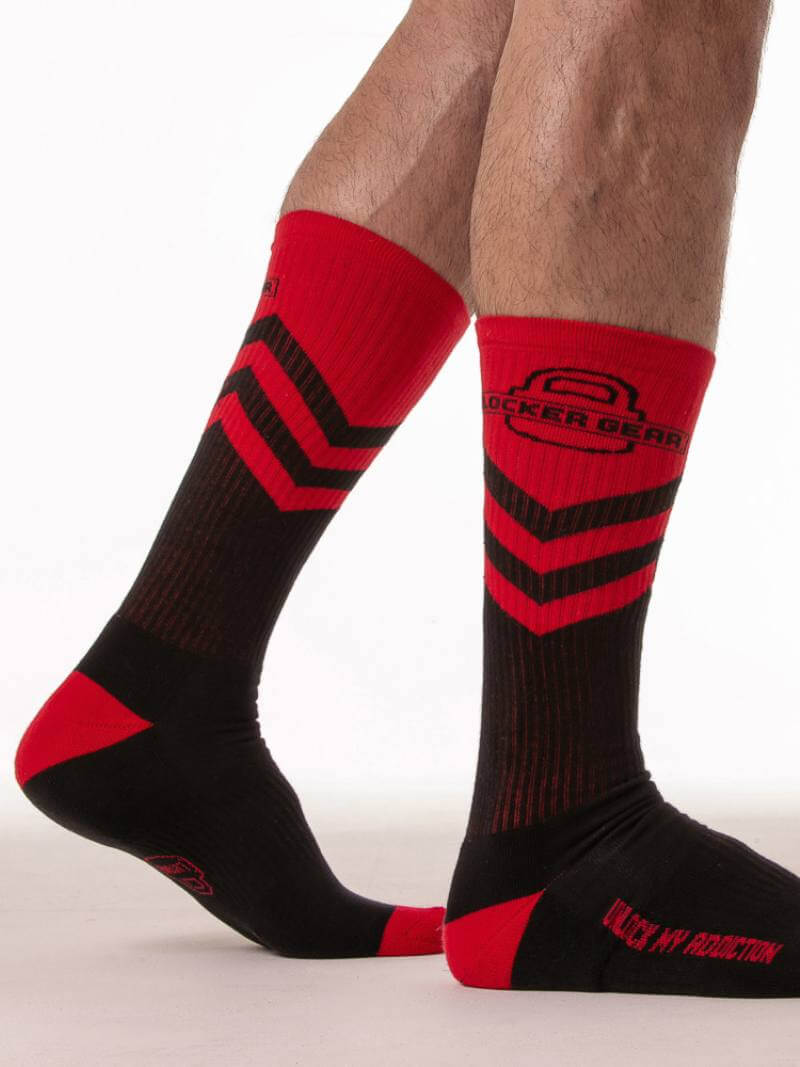 Black and red socks with a brand logo on a white background
