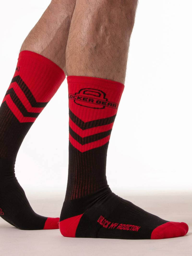 Black and red socks with a visible brand logo on a white background