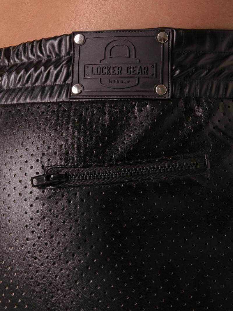 Black perforated leatherette fabric detail with pocket