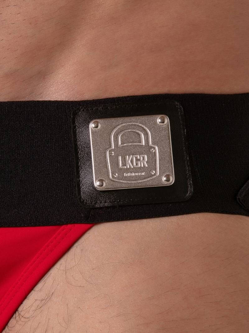 Black belt with a metallic 'LKCR' logo on a person's waist.