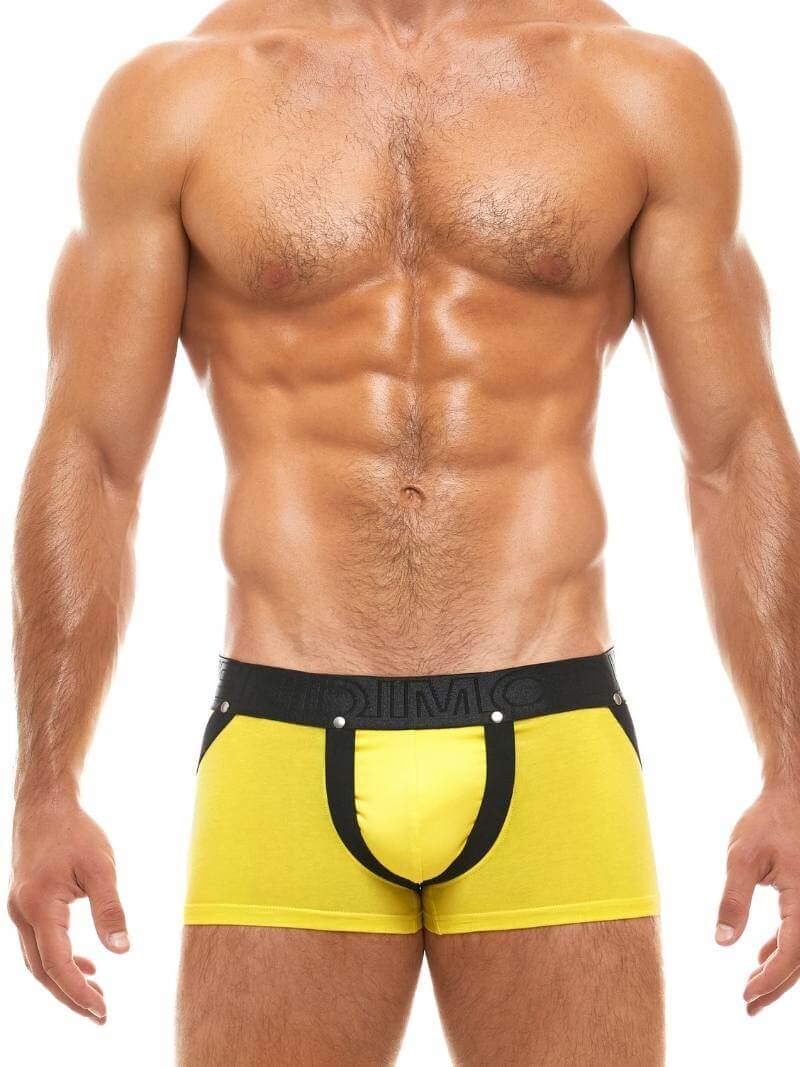 A model wearing a red and white Modus Vivendi Double Boost boxer brief with a waistband and front pouch straps.