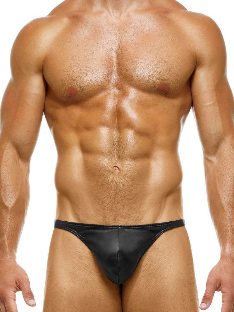 A red leather thong with a low-rise waist, featuring a contoured pouch and a metallic cutout tag on the back.
