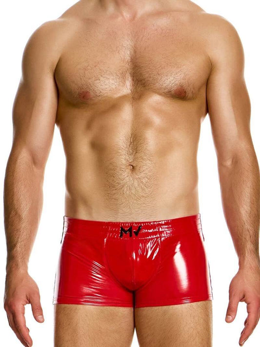 This image displays the MODUS VIVENDI PVC Vinyl Boxer Trunk, worn by a fit male model. The boxer trunk features a high shine, glossy PVC material, reminiscent of latex but made from 100% polyurethane for durability and a super shiny appearance.