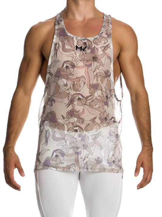 A male model wearing a sleeveless, floral print vest in pastel shades with a longer length and semi-racerback design.